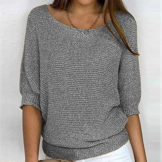 Women's loose-fit knit sweater with boat neck and 3/4 dolman sleeves