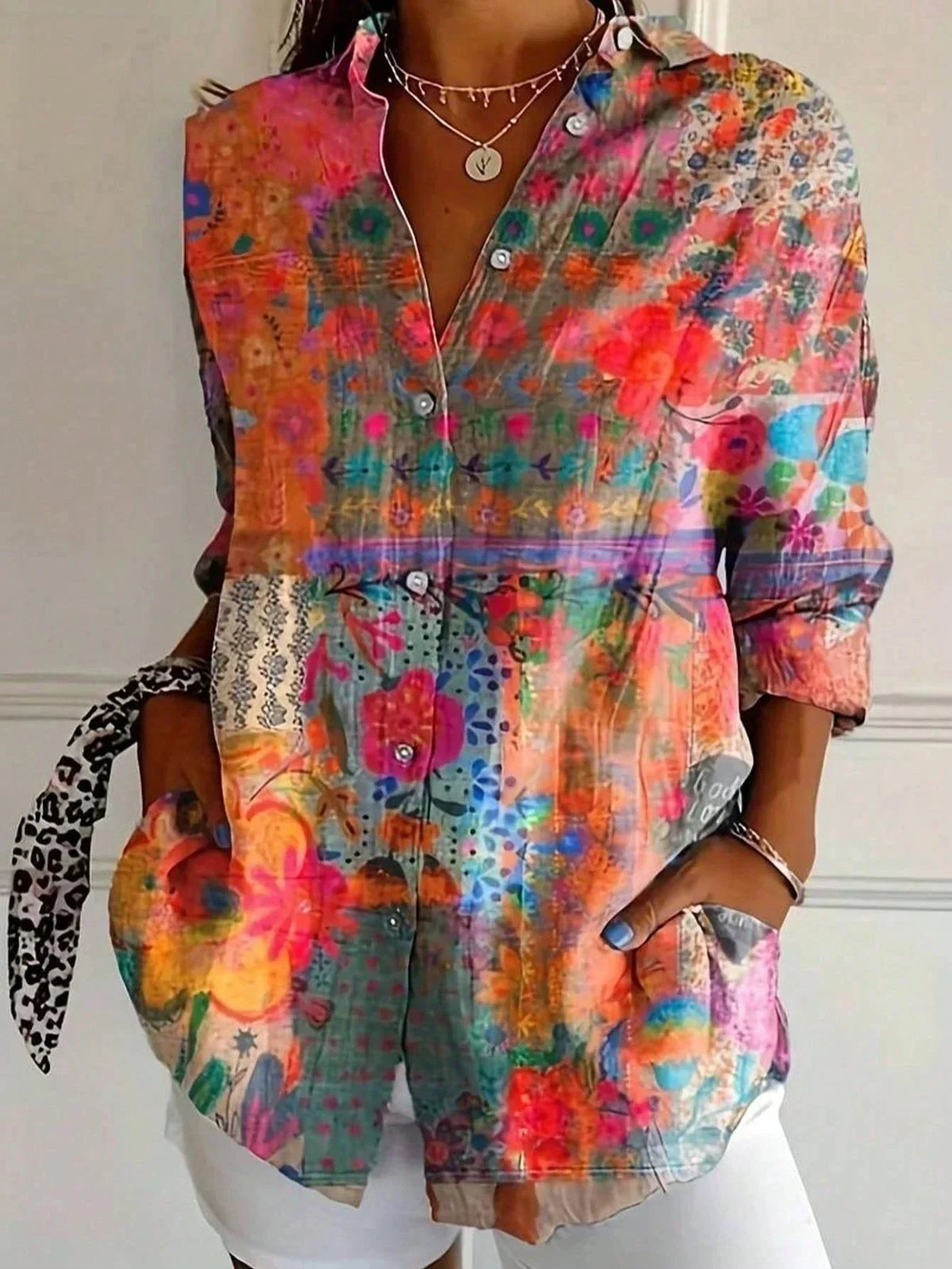 Women's colorful artistic floral long sleeve loose fit blouse with button-front – Orange