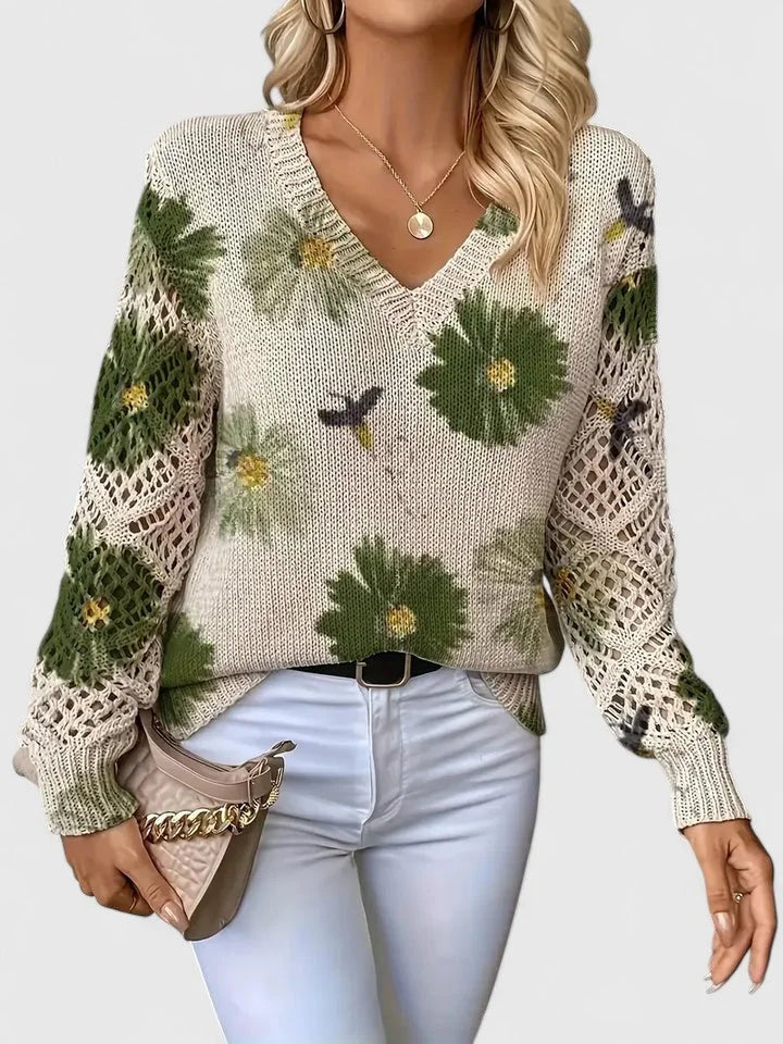 Women's floral knit sweater with V-neck and long open-knit sleeves